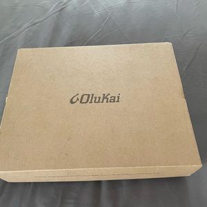 Brand new, unworn in box, with tags. Olukai Tuahine men’s flip flop. Size 10.